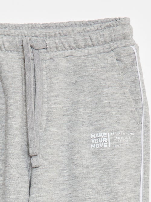 Calças de fato de treino em french terry com viés contrastante - Kiabi