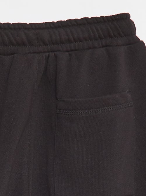 Calças de fato de treino em french terry com viés contrastante - Kiabi