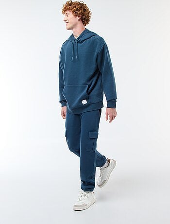 Calças de fato de treino em moletão com muitos bolsos