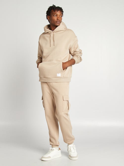 Calças de fato de treino em moletão com muitos bolsos - Kiabi