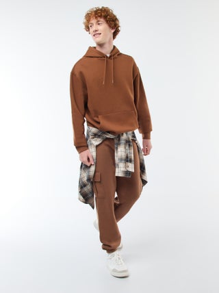 Calças de fato de treino em moletão com muitos bolsos