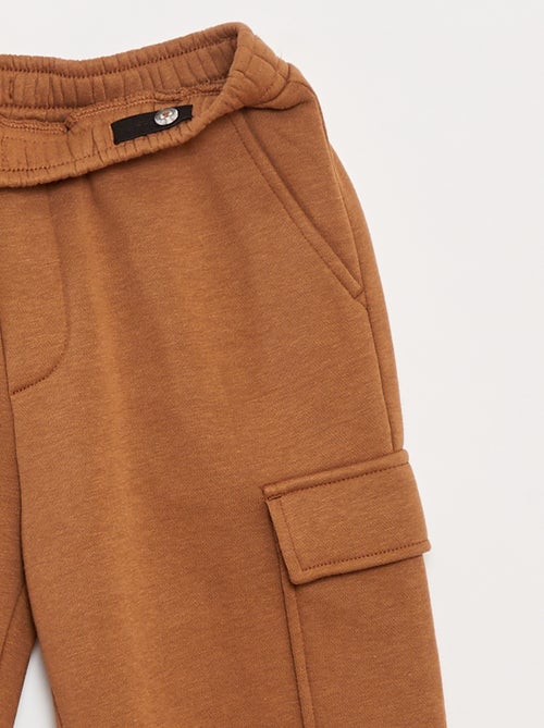 Calças de fato de treino em moletão liso com vários bolsos - Kiabi