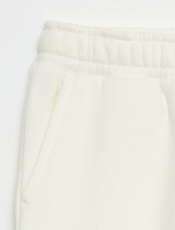 Calças de fato de treino em moletão liso com vários bolsos