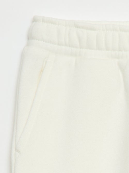 Calças de fato de treino em moletão liso com vários bolsos - Kiabi