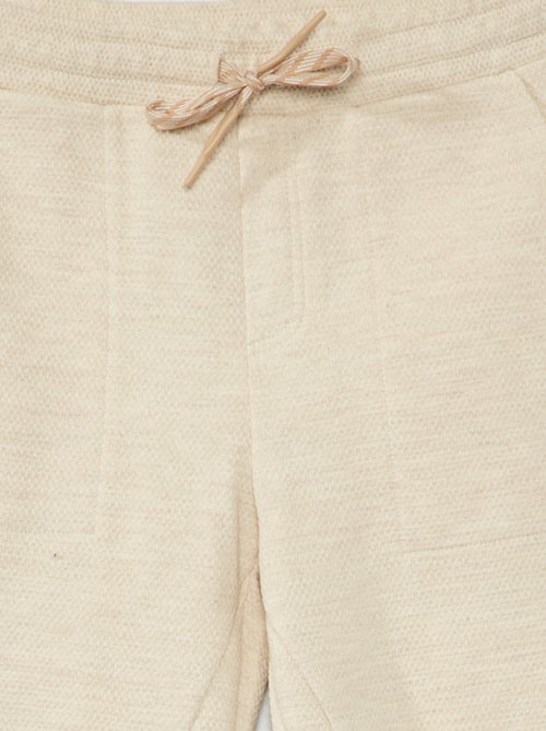 Calças de fato de treino em piqué de algodão - Corte + confortável - Kiabi