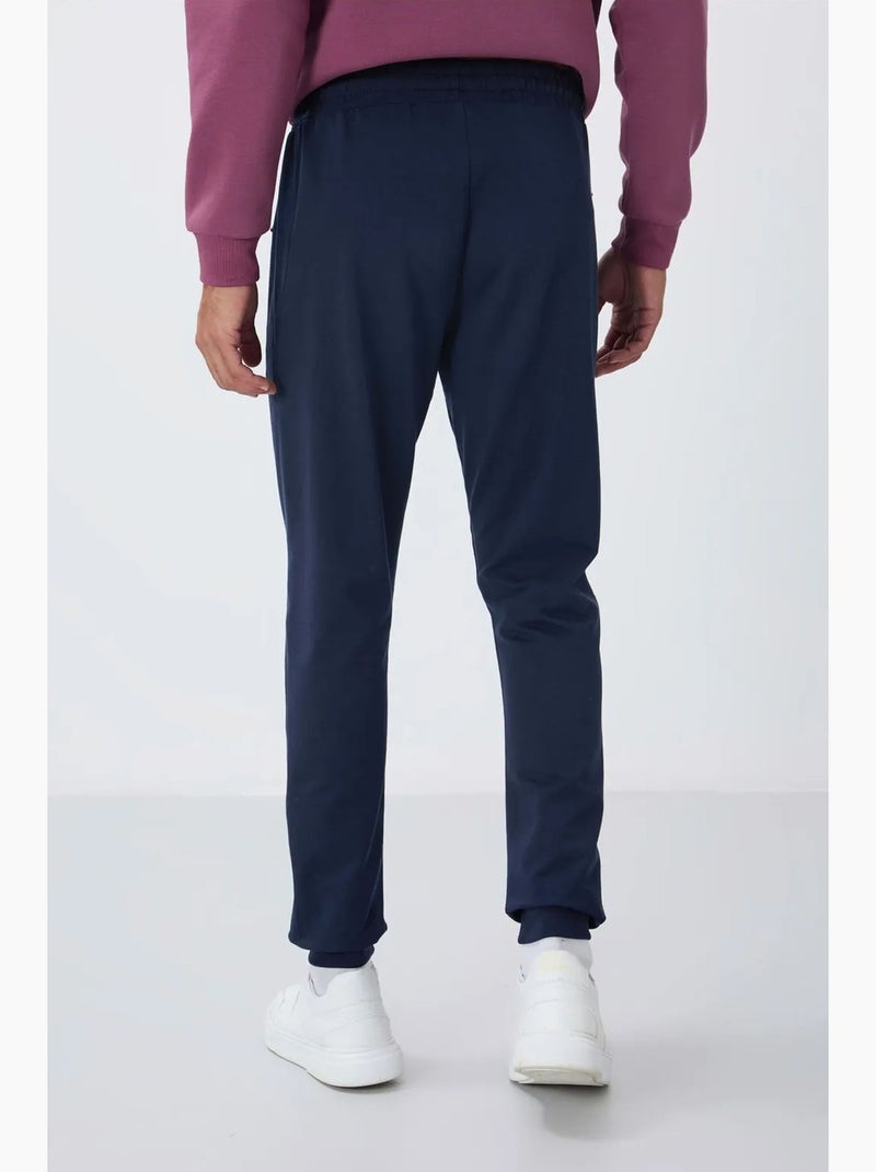 Calças de fato de treino jogger de homem com bolso com fecho tommy Azul-marinho - Kiabi