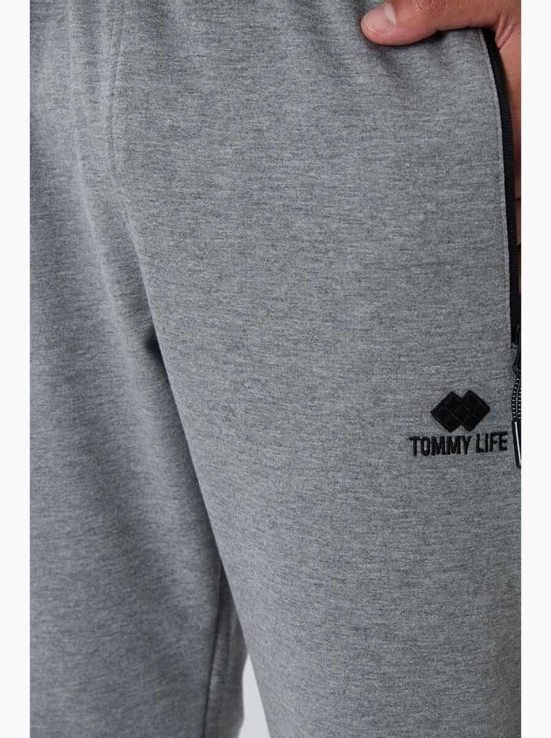 Calças de fato de treino jogger de homem com bolso com fecho tommy Cinza - Kiabi