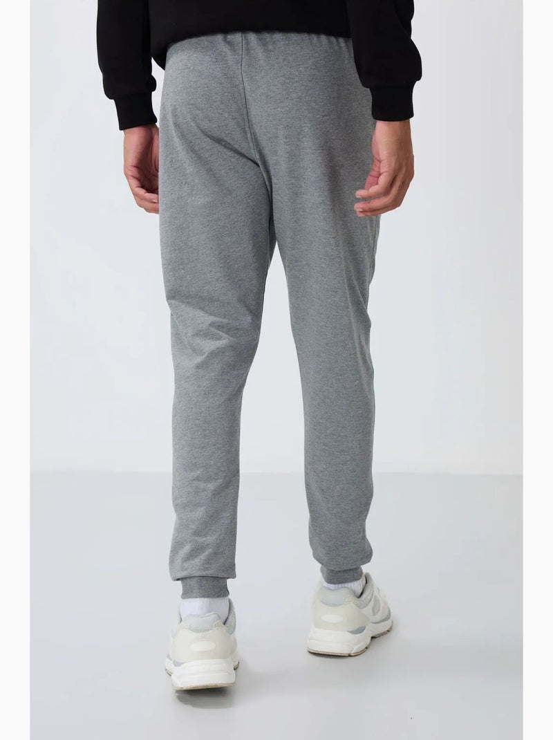 Calças de fato de treino jogger de homem com bolso com fecho tommy Cinza - Kiabi