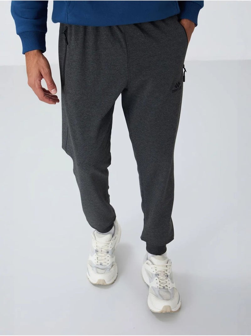 Calças de fato de treino jogger de homem com bolso com fecho tommy Cinza-preto - Kiabi