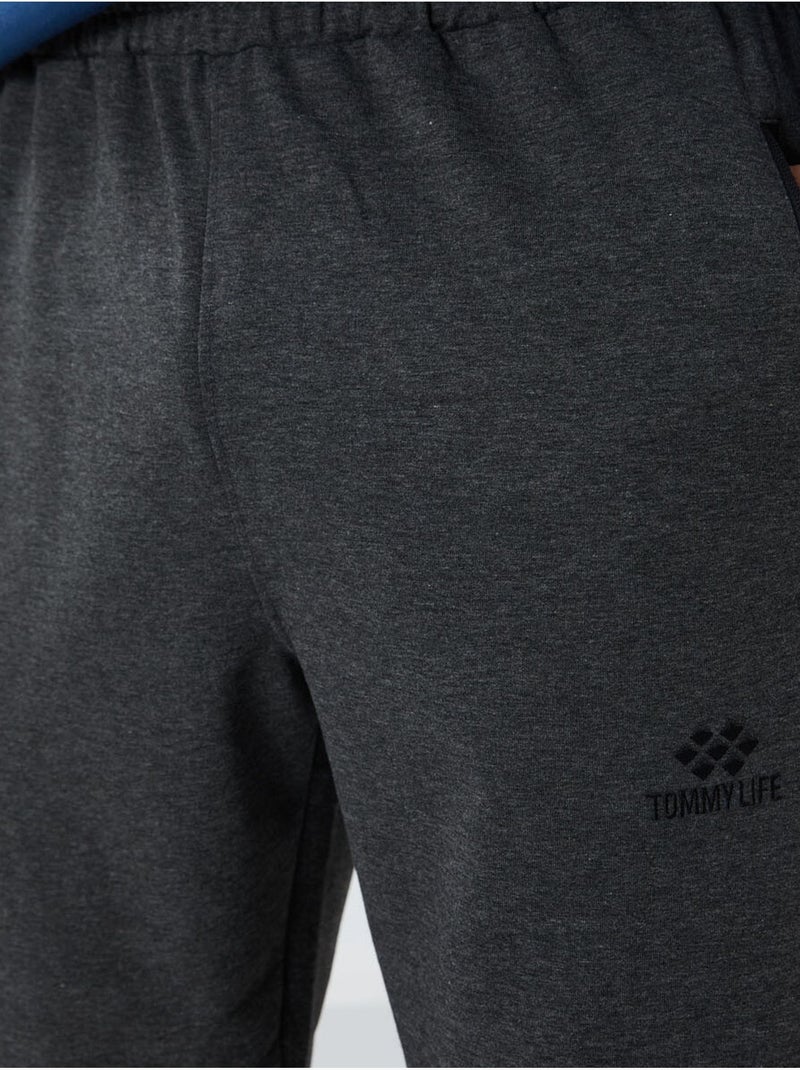 Calças de fato de treino jogger de homem com bolso com fecho tommy Cinza-preto - Kiabi