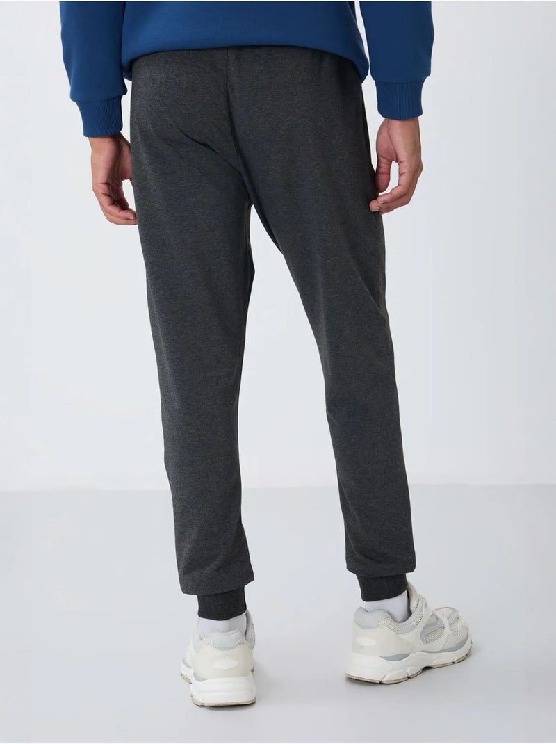 Calças de fato de treino jogger de homem com bolso com fecho tommy Cinza-preto - Kiabi