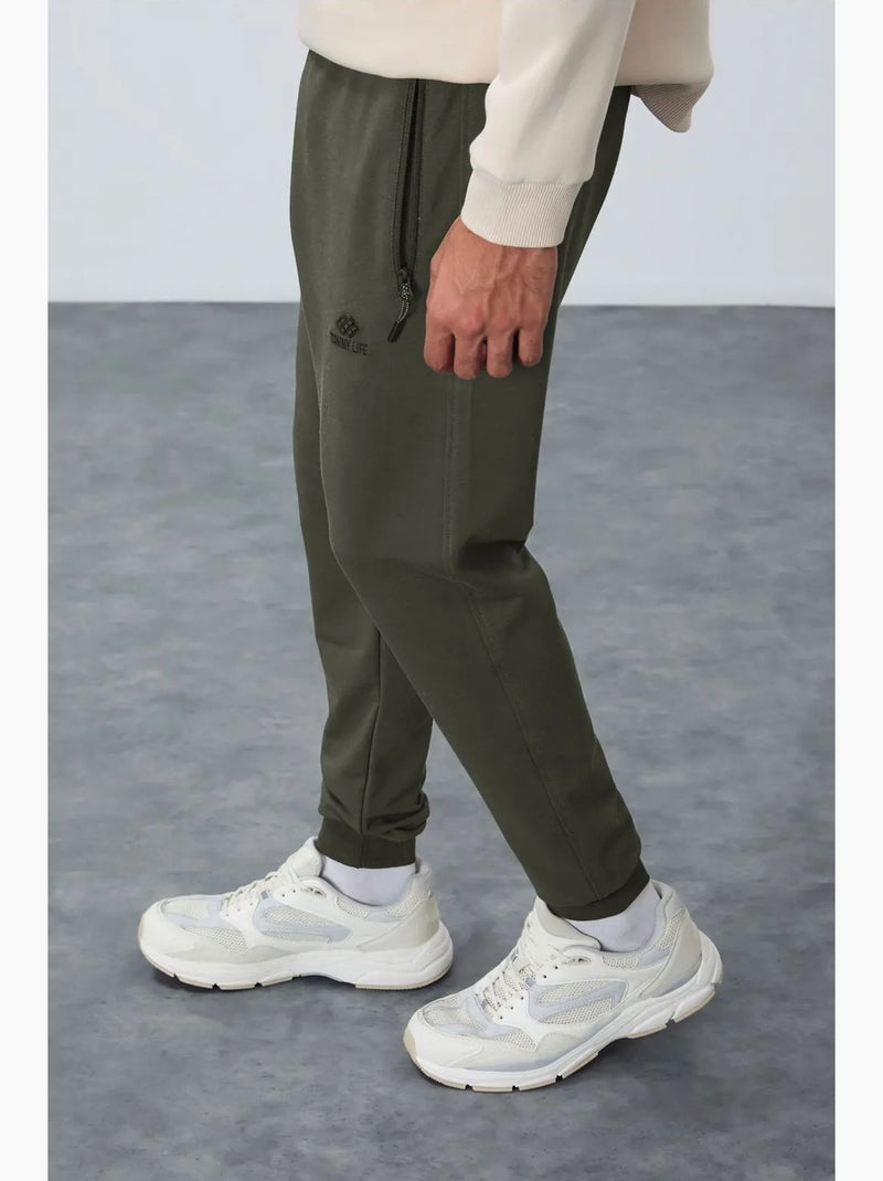 Calças de fato de treino jogger de homem com bolso com fecho tommy Verde cáqui - Kiabi