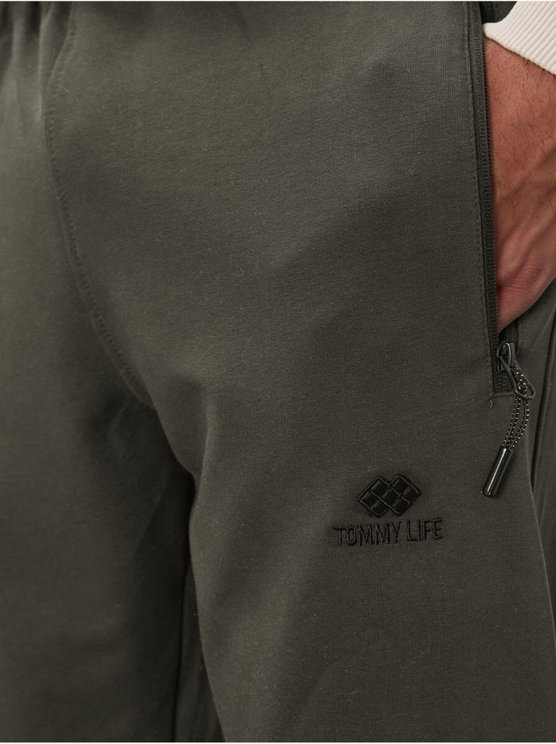 Calças de fato de treino jogger de homem com bolso com fecho tommy Verde cáqui - Kiabi