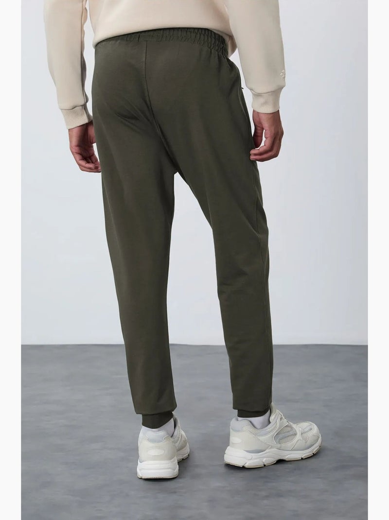 Calças de fato de treino jogger de homem com bolso com fecho tommy Verde cáqui - Kiabi