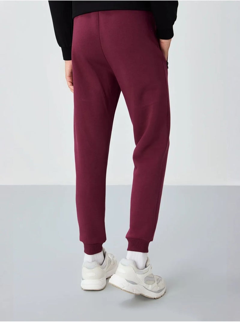 Calças de fato de treino jogger de homem tommy Vermelho bordô - Kiabi