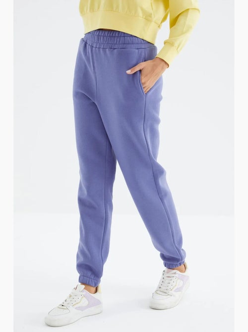 Calças de fato de treino jogger em fleece de cintura subida para mulher tommy - Kiabi Calças de fato de treino jogger em fleece de cintura subida para mulher tommy - Kiabi