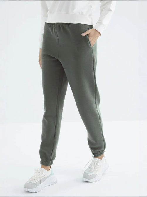 Calças de fato de treino jogger em fleece de cintura subida para mulher tommy - Kiabi Calças de fato de treino jogger em fleece de cintura subida para mulher tommy - Kiabi