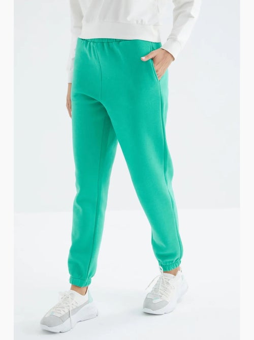 Calças de fato de treino jogger em fleece de cintura subida para mulher tommy - Kiabi Calças de fato de treino jogger em fleece de cintura subida para mulher tommy - Kiabi