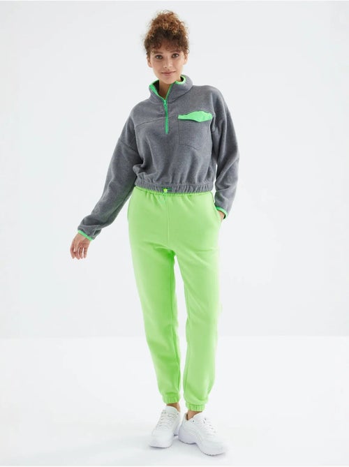 Calças de fato de treino jogger em fleece de cintura subida para mulher tommy - Kiabi Calças de fato de treino jogger em fleece de cintura subida para mulher tommy - Kiabi