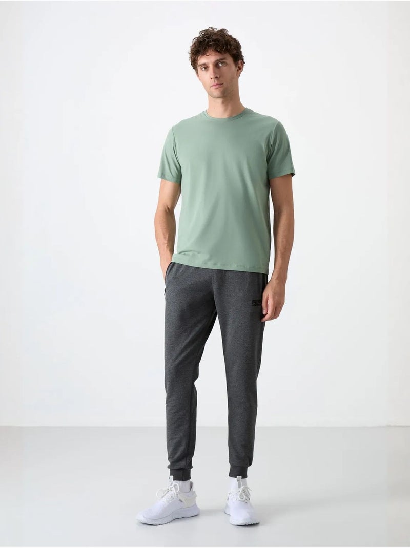 Calças de fato de treino jogger lisas para homem tommy Cinza-preto - Kiabi