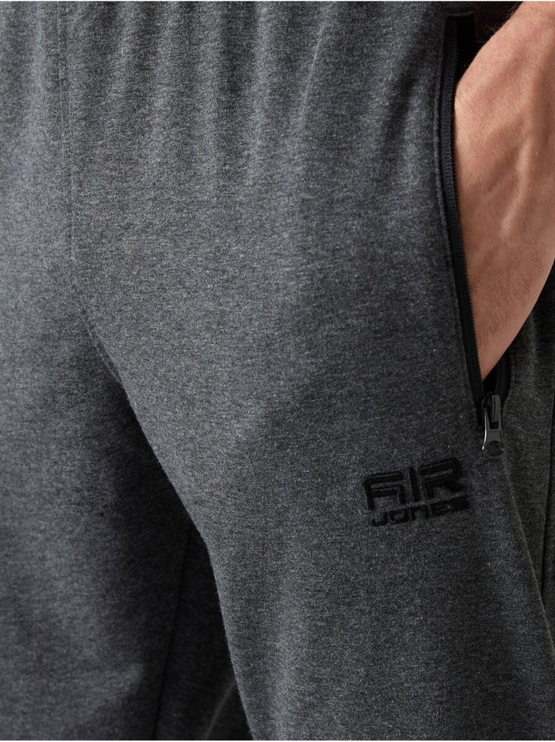 Calças de fato de treino jogger lisas para homem tommy Cinza-preto - Kiabi