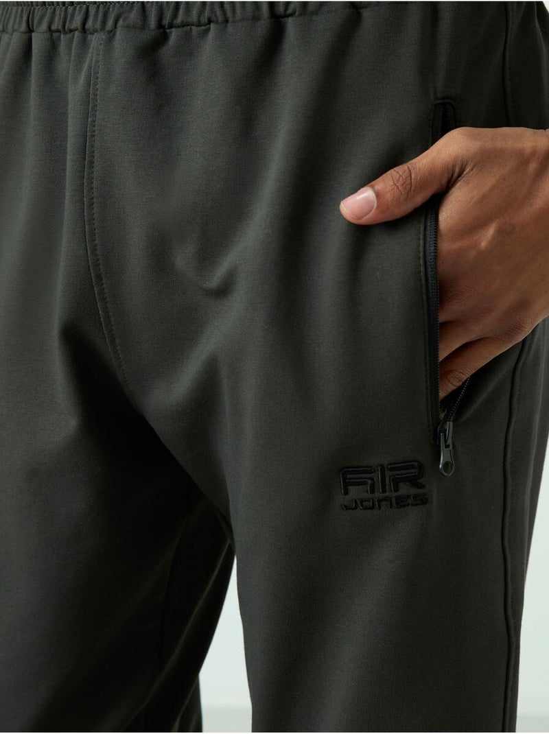 Calças de fato de treino jogger lisas para homem tommy Verde escuro - Kiabi