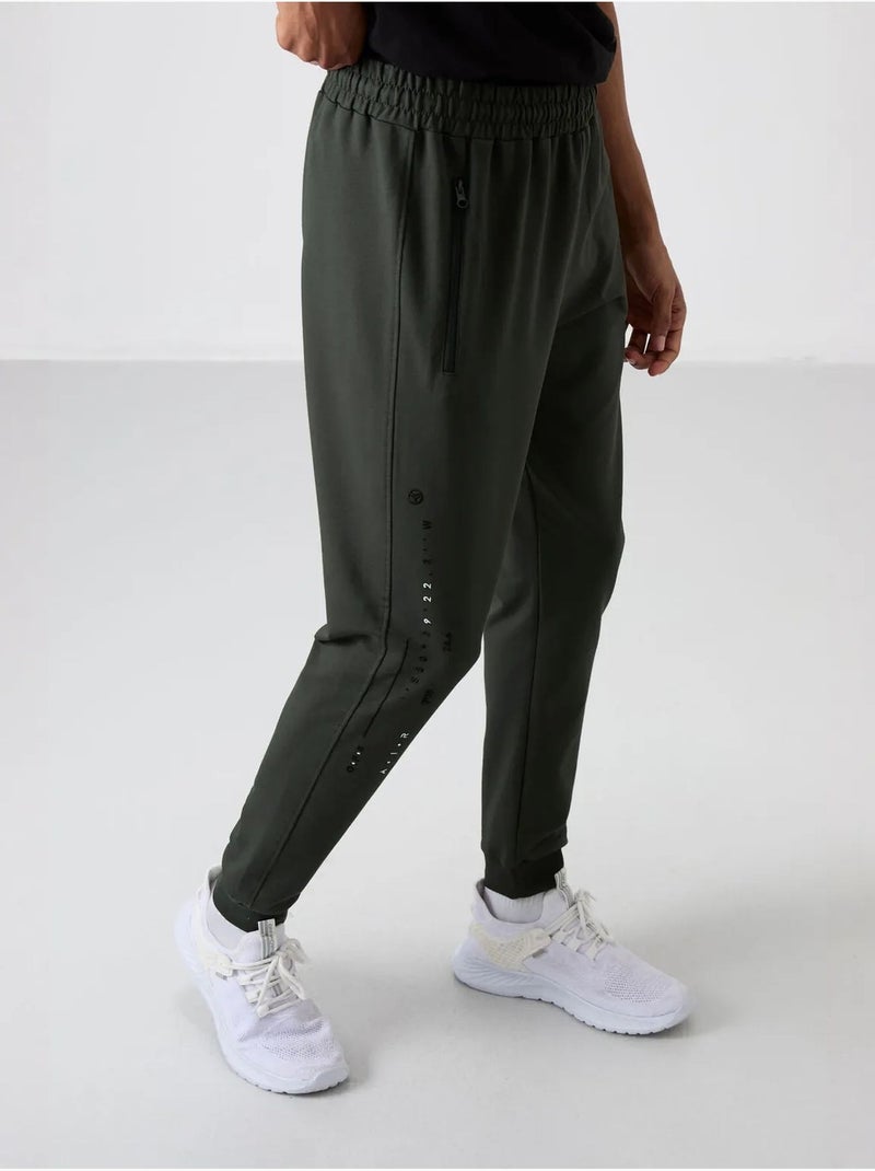Calças de fato de treino jogger lisas para homem tommy Verde escuro - Kiabi