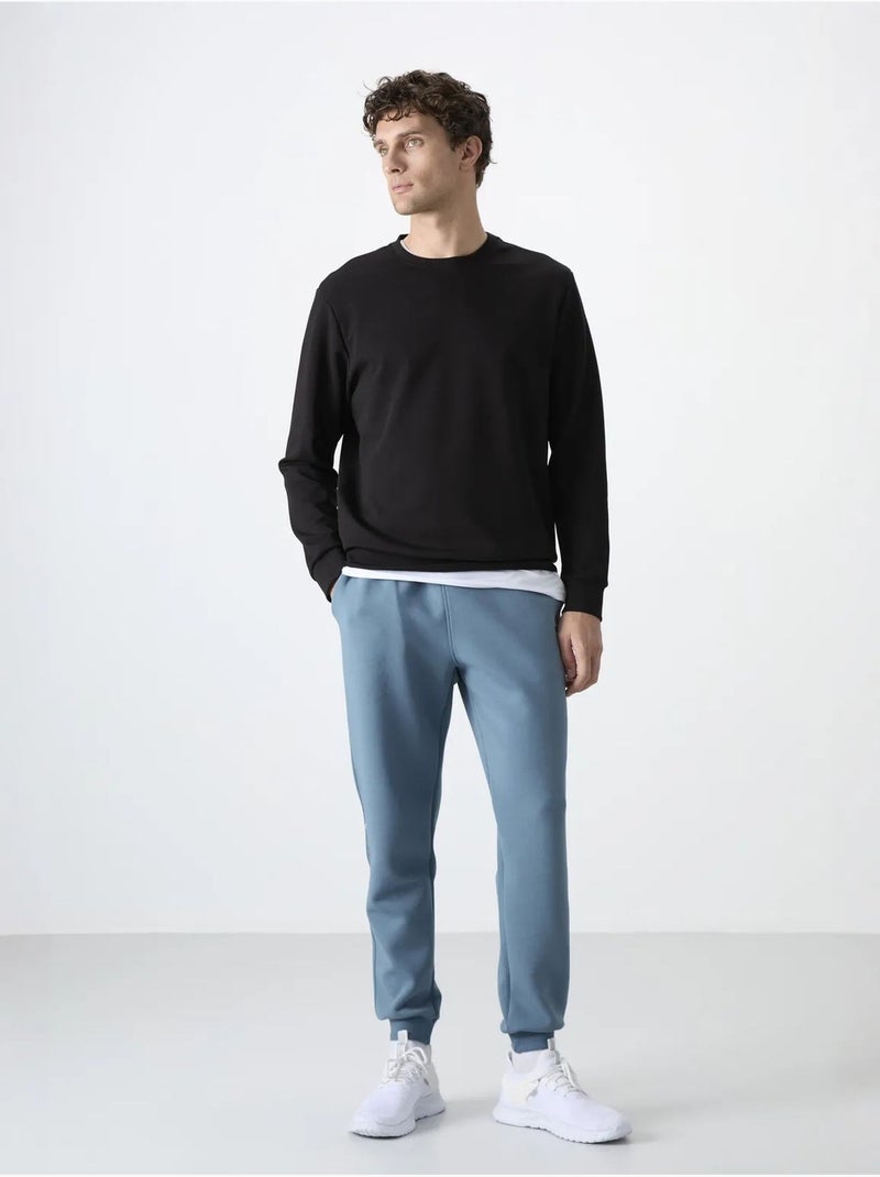 Calças de fato de treino jogger slim para homem tommy Azul-safira - Kiabi