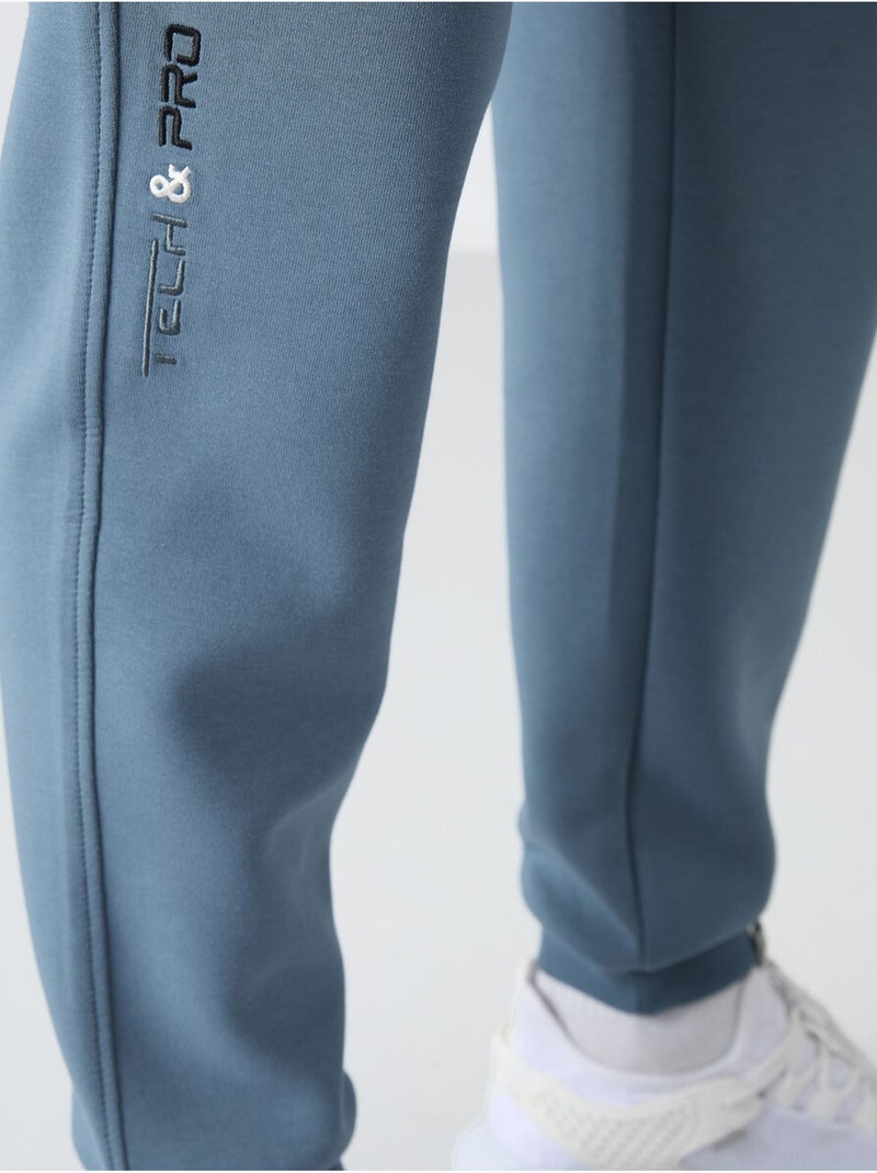 Calças de fato de treino jogger slim para homem tommy Azul-safira - Kiabi
