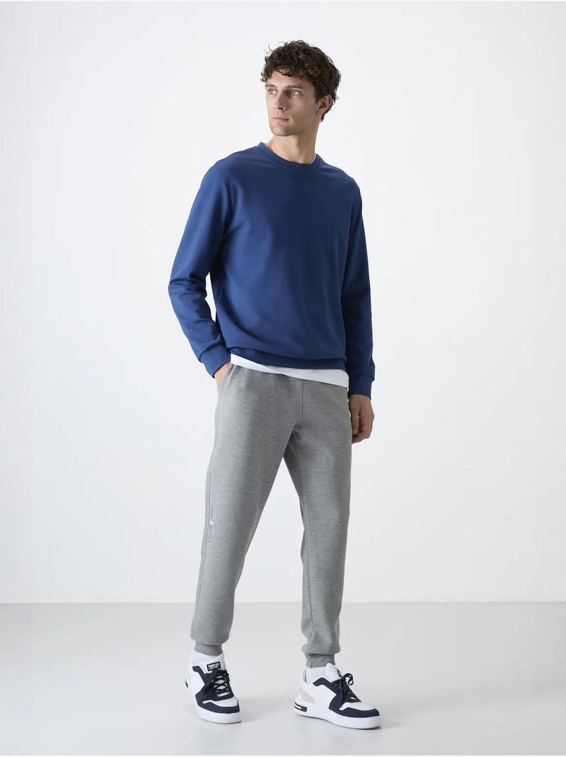 Calças de fato de treino jogger slim para homem tommy Cinza claro - Kiabi