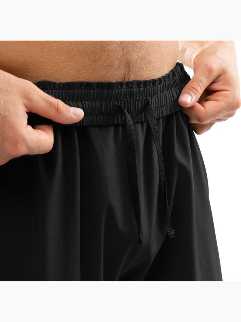 Calças de fato de treino largas para homem Preto - Kiabi