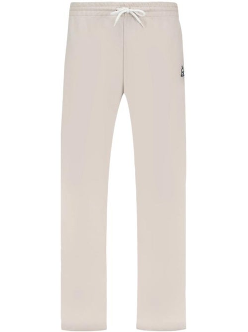Calças de Fato de Treino Le Coq Sportif Contemporâneas Bege de Perna Larga para Mulher - Kiabi Calças de Fato de Treino Le Coq Sportif Contemporâneas Bege de Perna Larga para Mulher - Kiabi