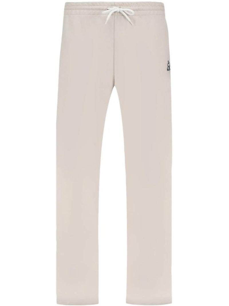 Calças de Fato de Treino Le Coq Sportif Contemporâneas Bege de Perna Larga para Mulher Bege - Kiabi