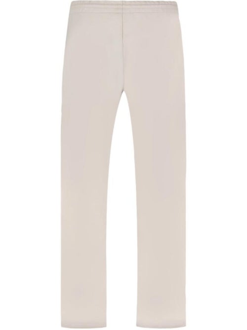 Calças de Fato de Treino Le Coq Sportif Contemporâneas Bege de Perna Larga para Mulher - Kiabi Calças de Fato de Treino Le Coq Sportif Contemporâneas Bege de Perna Larga para Mulher - Kiabi