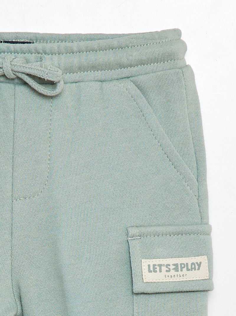 Calças de fato de treino lisas com bolsos com aba VERDE - Kiabi