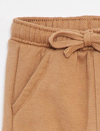 Calças de fato de treino lisas com bolsos grandes