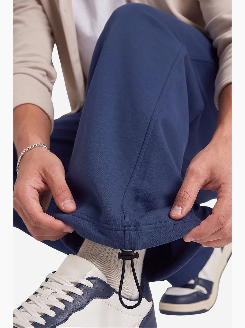 Calças de fato de treino masculinas em mistura de algodão tommy Azul-marinho - Kiabi