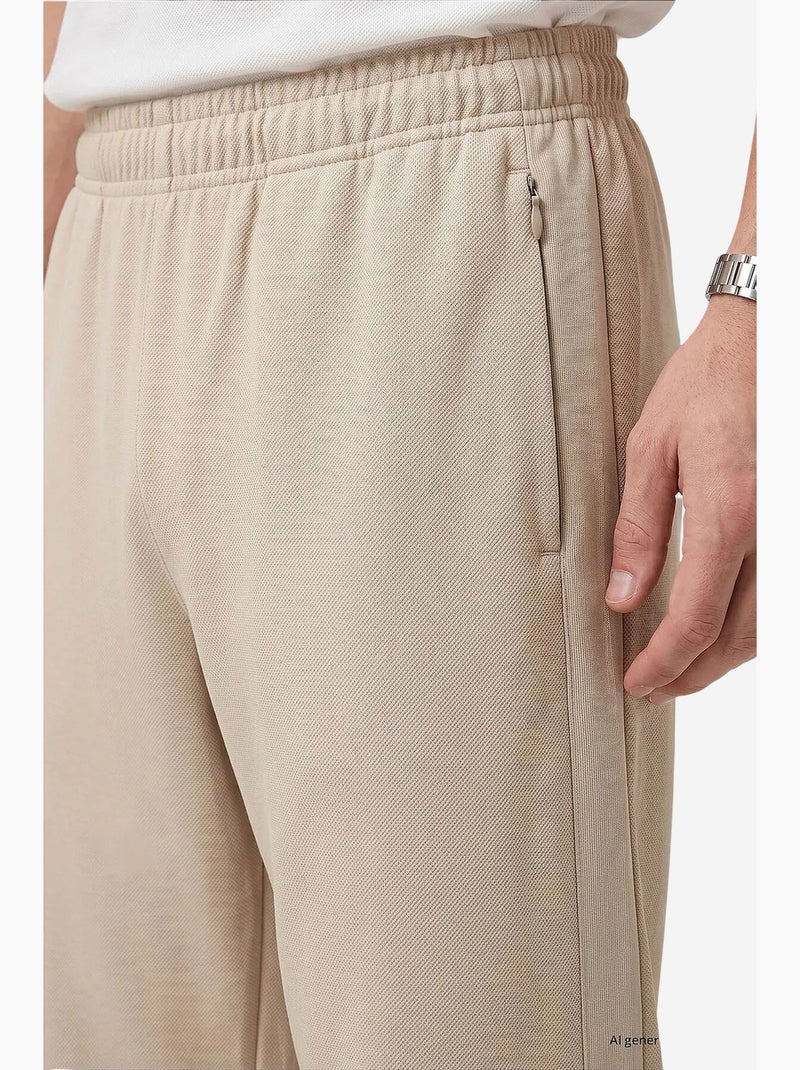 Calças de fato de treino masculinas em mistura de viscose tommy Bege-argila - Kiabi