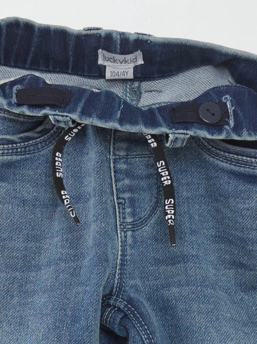 Calças de ganga com cintura elástica e cordões - Kiabi