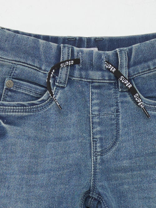 Calças de ganga com cintura elástica e cordões - Kiabi