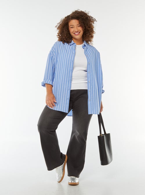 Calças de ganga com cintura standard 'Carmakoma' corte flare/bootcut - Kiabi