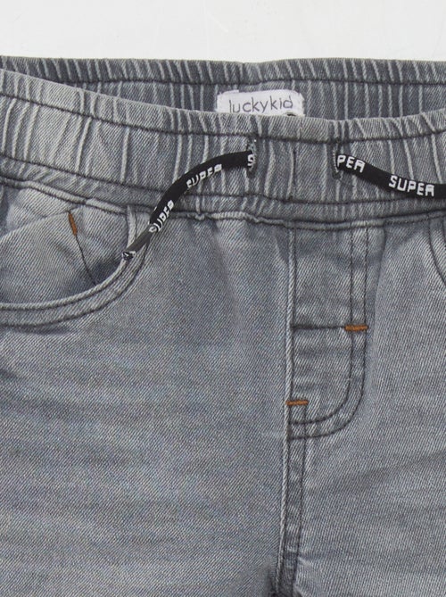 Calças de ganga de cintura elástica com cordões - Kiabi