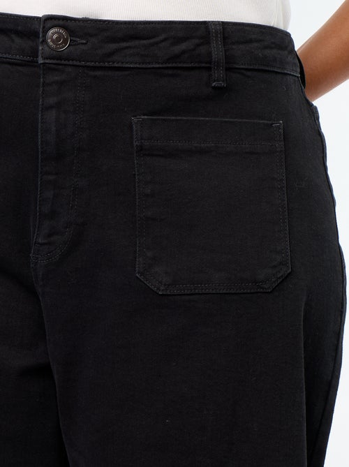 Calças de ganga largas com bolsos chapados - Kiabi Calças de ganga largas com bolsos chapados - Kiabi