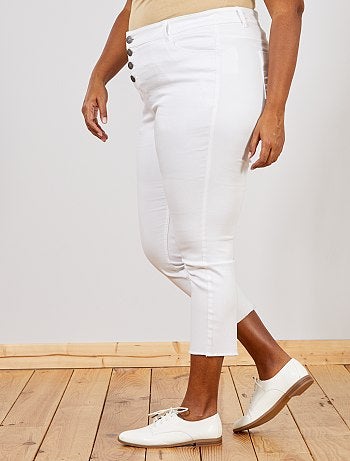 Calças de ganga slim com acabamento desfiado - Kiabi