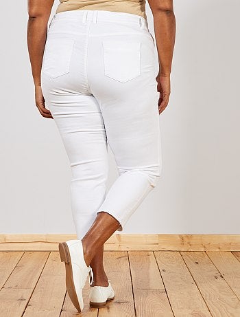 Calças de ganga slim com acabamento desfiado - Kiabi