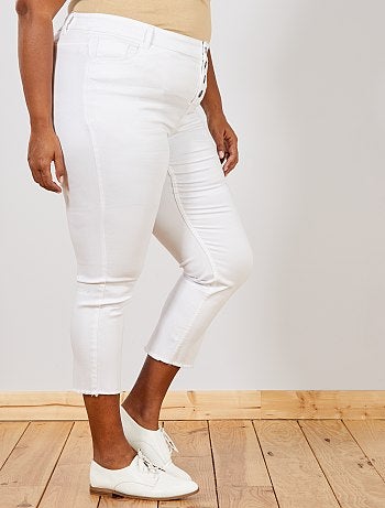 Calças de ganga slim com acabamento desfiado - Kiabi