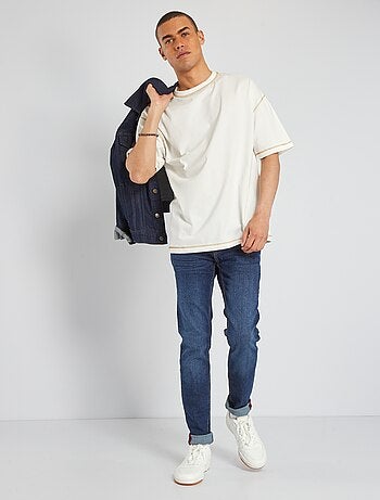 Calças de ganga slim efeito usado - Kiabi