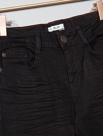 Calças de ganga slim efeito usado - Kiabi