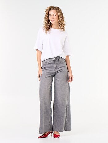 Calças de ganga wide leg com bainha desfiada