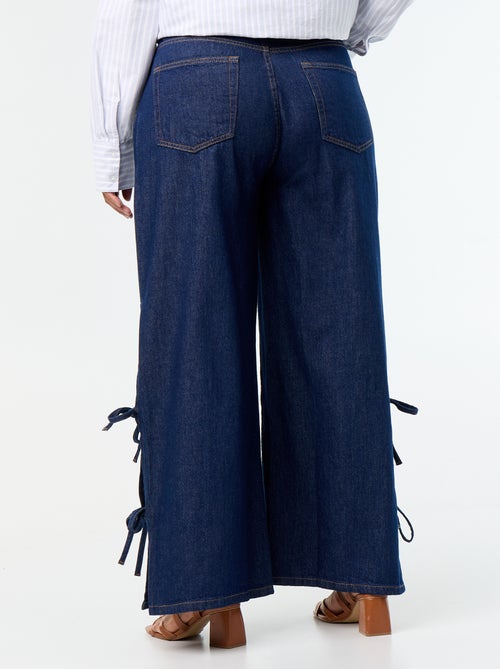 Calças de ganga wide leg com laços fantasia nas laterais - Kiabi
